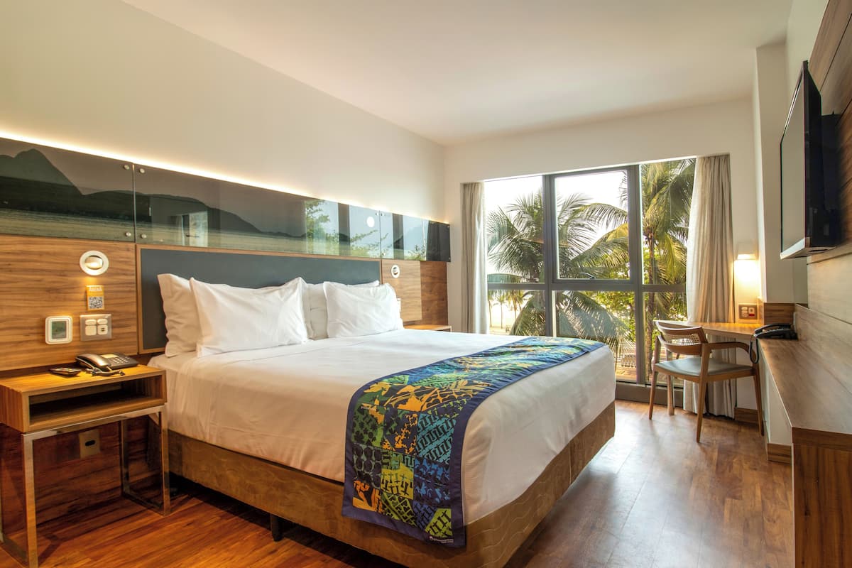 Superior Double Room, Beach View | Minibar, in-room safe, individually decorated, individually furnished