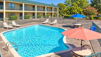Outdoor pool, open 10:00 AM to 10:00 PM, pool umbrellas, sun loungers