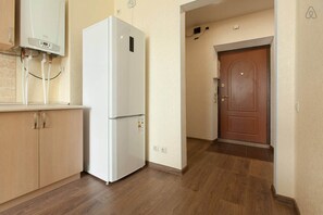 Apartment, Balcony (For 3 people) | Private kitchen | Full-size fridge, microwave, stovetop, coffee/tea maker