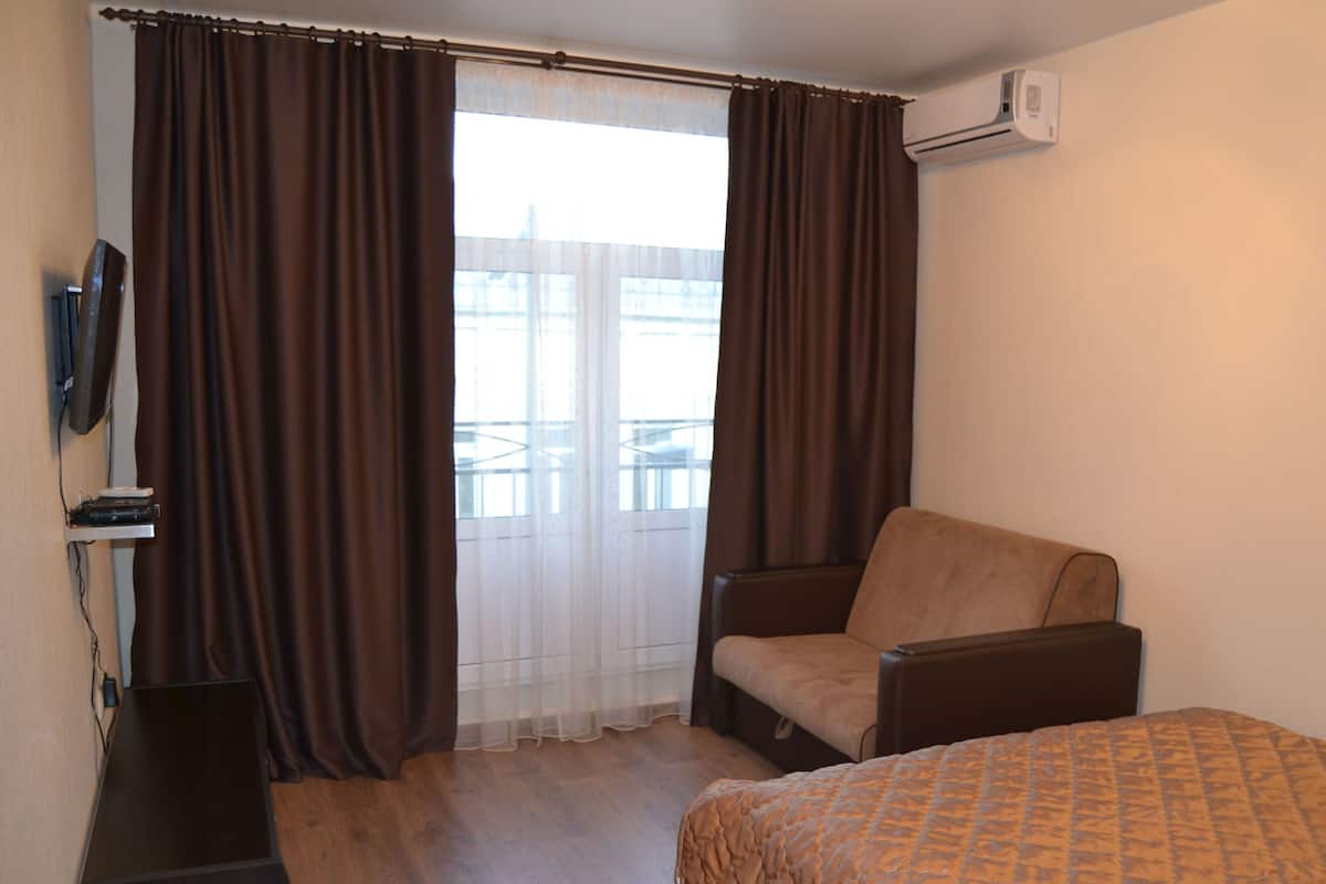 Apartment, 1 Double Bed with Sofa bed, Balcony | Living room | 32-inch LED TV with cable channels, TV
