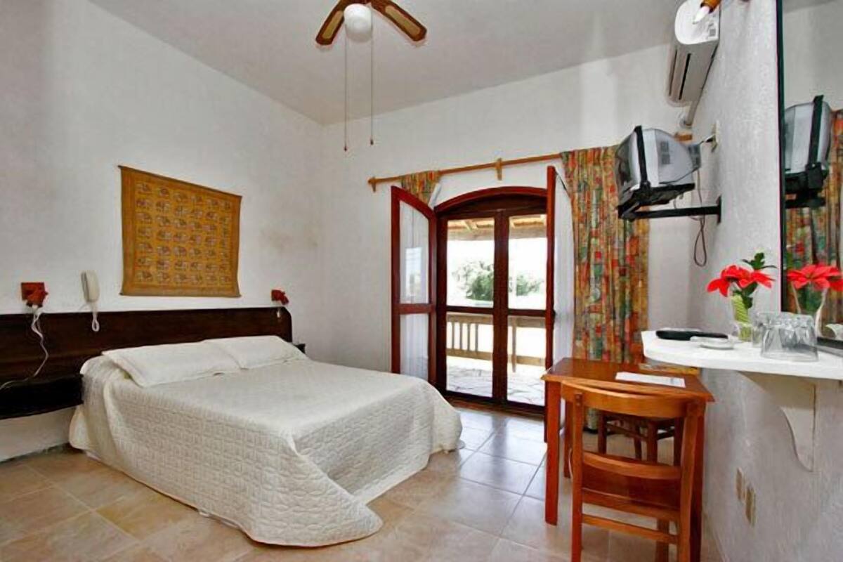 Roupas de cama premium, edredons de pluma, cofres nos quartos