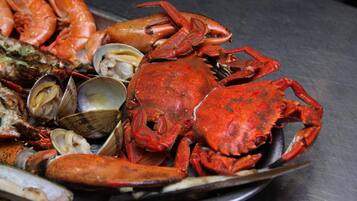A seafood platter with various shellfish and crustaceans.