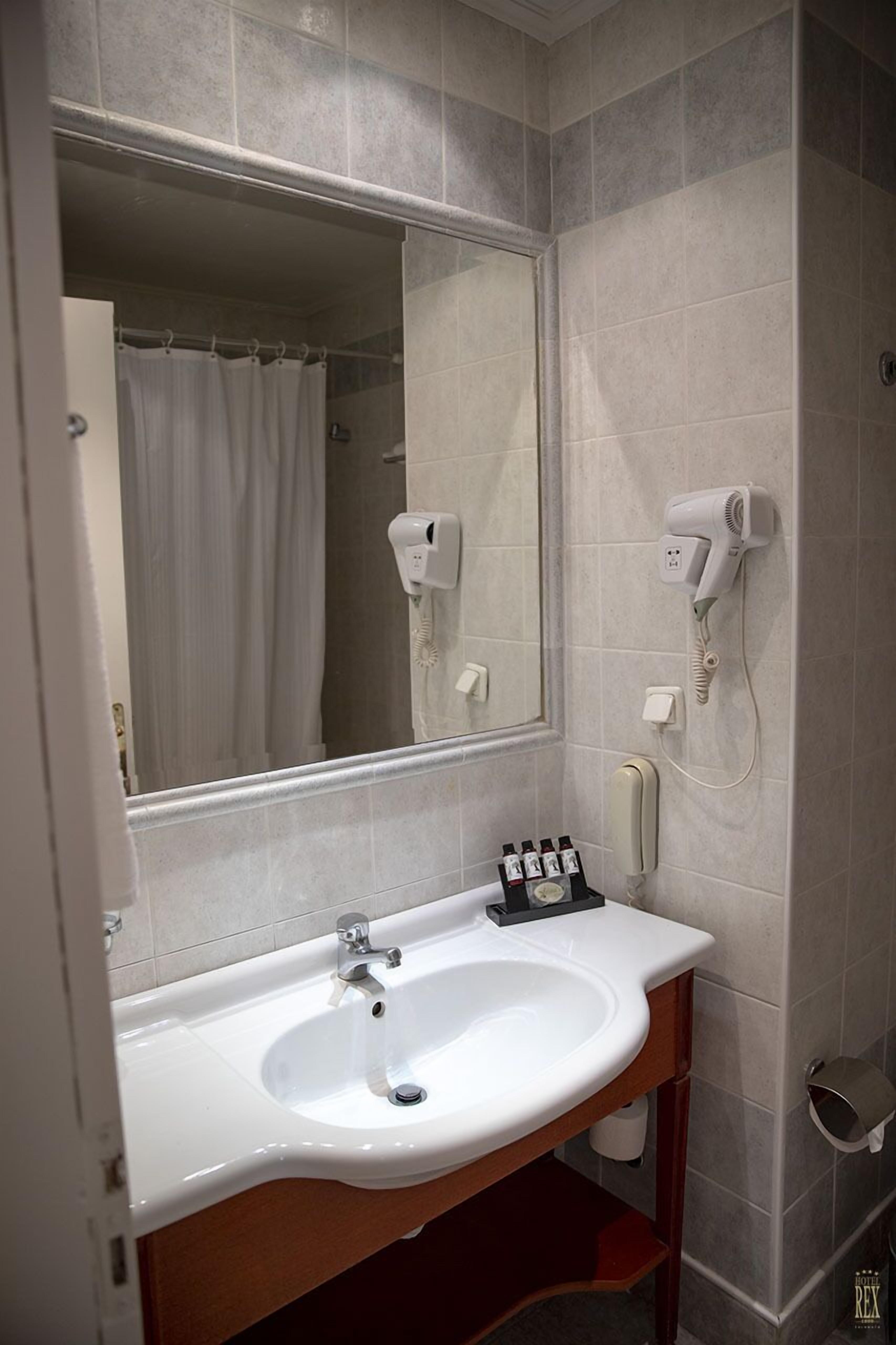 single room | bathroom | hair dryer, towels