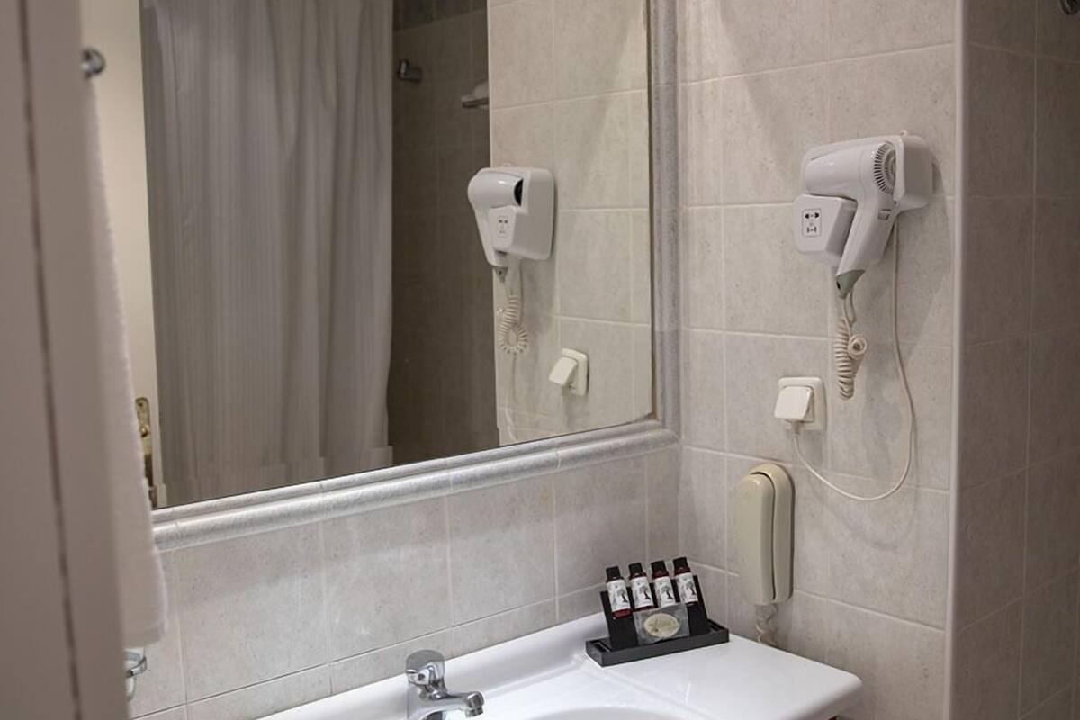 single room | bathroom | hair dryer, towels