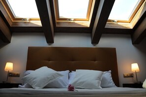 Desk, blackout curtains, soundproofing, rollaway beds