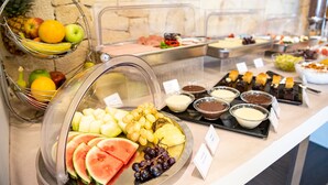 A buffet with various fruits, vegetables, and sauces. - Lagaria Hotel (Kassandra)
