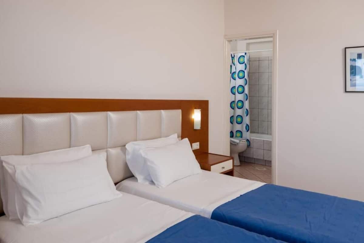 apartment, 2 bedrooms, bay view | in-room safe, soundproofing, iron/ironing board, free wifi