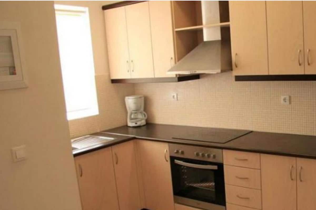 deluxe family suite | private kitchen | fridge, stovetop, coffee/tea maker, electric kettle