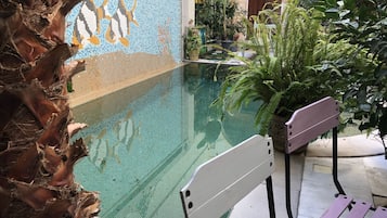 Outdoor pool, pool umbrellas, pool loungers