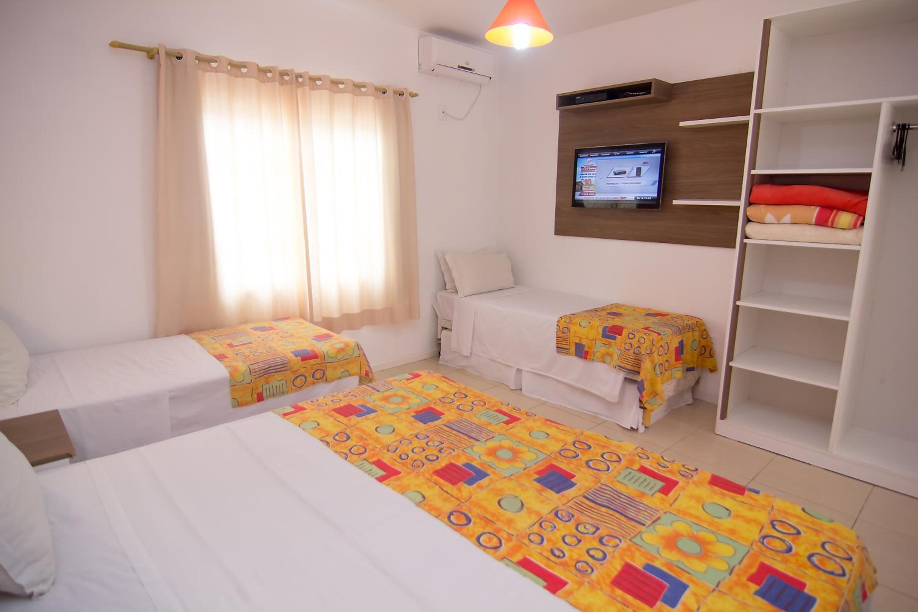 Frigobar, Wi-Fi de cortesia, roupa de cama