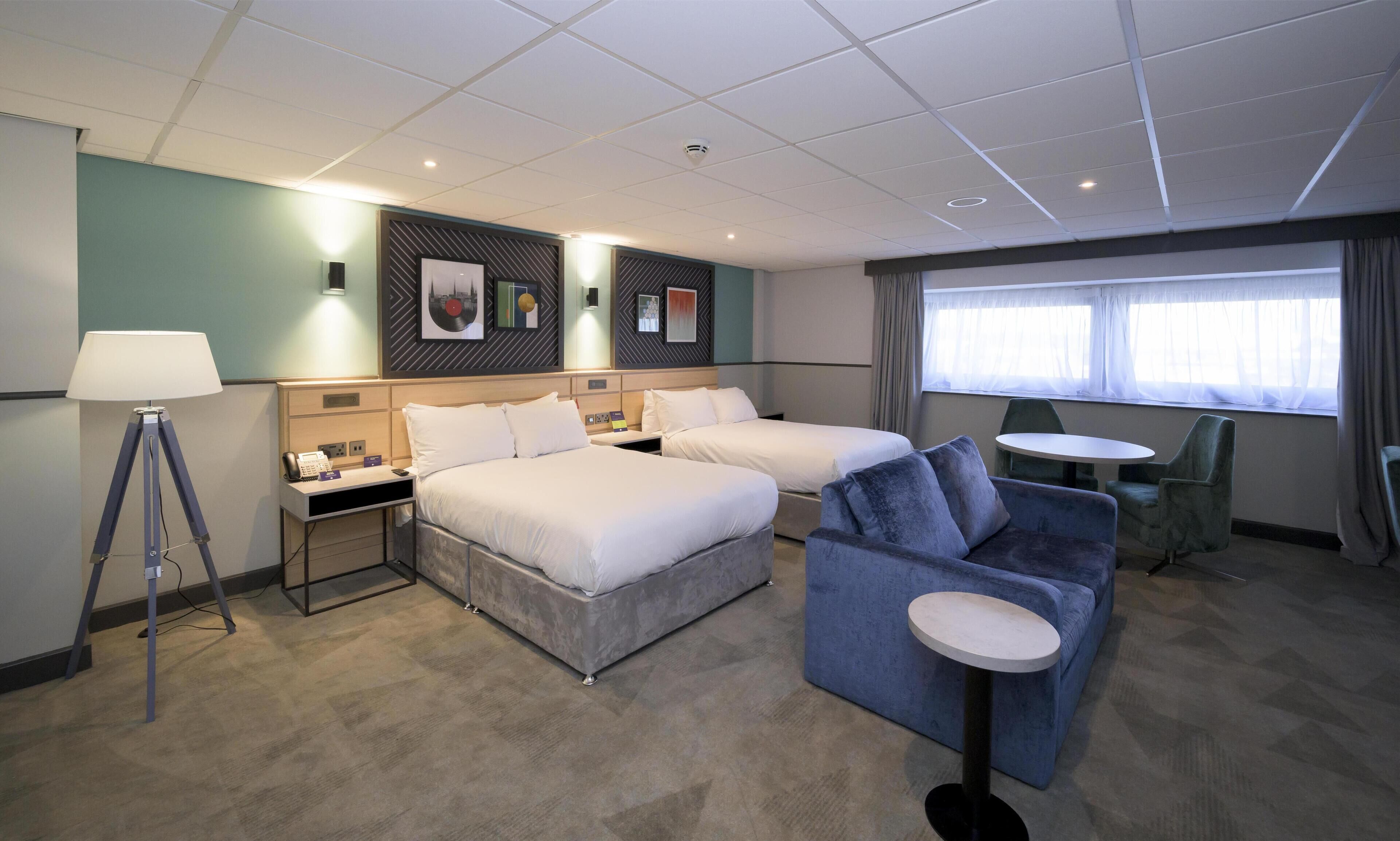 Deluxe Room, 2 Double Beds, Accessible | Living area | Flat-screen TV