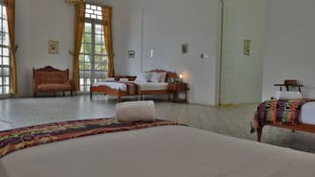 Triple Room | Minibar, in-room safe, desk, soundproofing