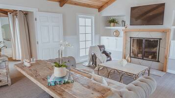 Two Bedroom Suite Bungalow | Living area | 60-inch flat-screen TV with cable channels, TV, pay movies