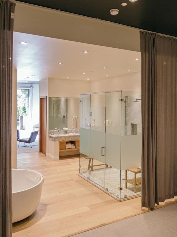Estate Suite | Bathroom | Designer toiletries, hair dryer, bathrobes, slippers