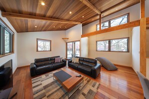 Luxury Chalet | Living area | 55-inch flat-screen TV with digital channels, TV, iPod dock - Bluebird Chalets by The Hakuba Collection (Hakuba)