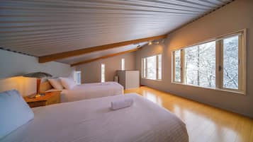 2 bedrooms, desk, blackout drapes, soundproofing