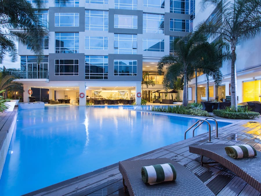 Outdoor pool, pool umbrellas, sun loungers