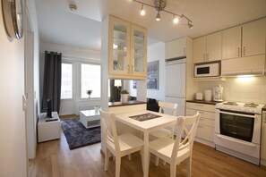 Apartment, 1 Bedroom, Private Bathroom | Private kitchen | Full-size fridge, microwave, oven, stovetop - Kotimaailma Apartments Rovaniemi (Rovaniemi)