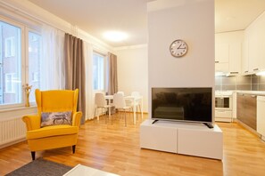 City Twin Room, 1 Bedroom, Sauna | Living room | Flat-screen TV - Kotimaailma Apartments Rovaniemi (Rovaniemi)