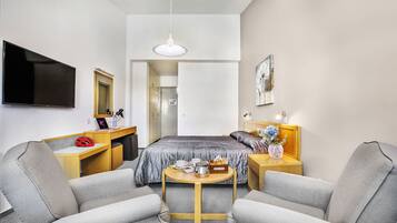 Habitación superior | Caja de seguridad en la habitación, wifi gratis y ropa de cama