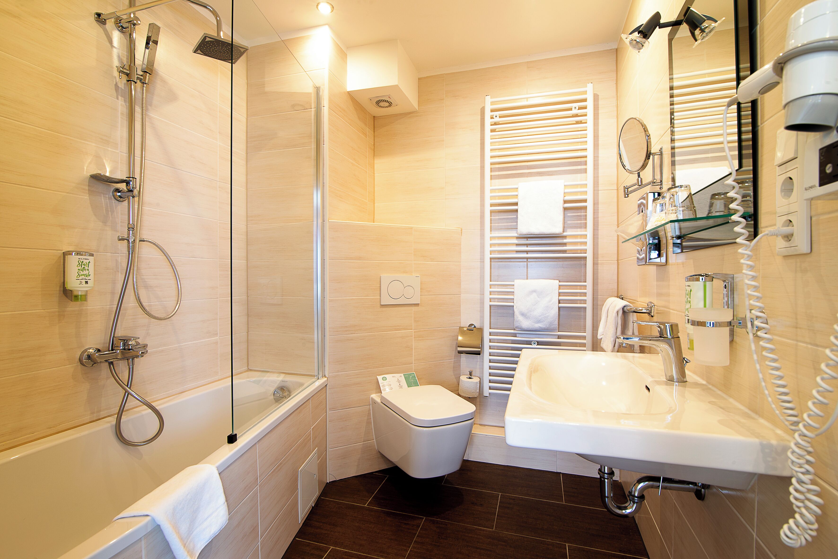 suite | bathroom | shower, hair dryer, towels
