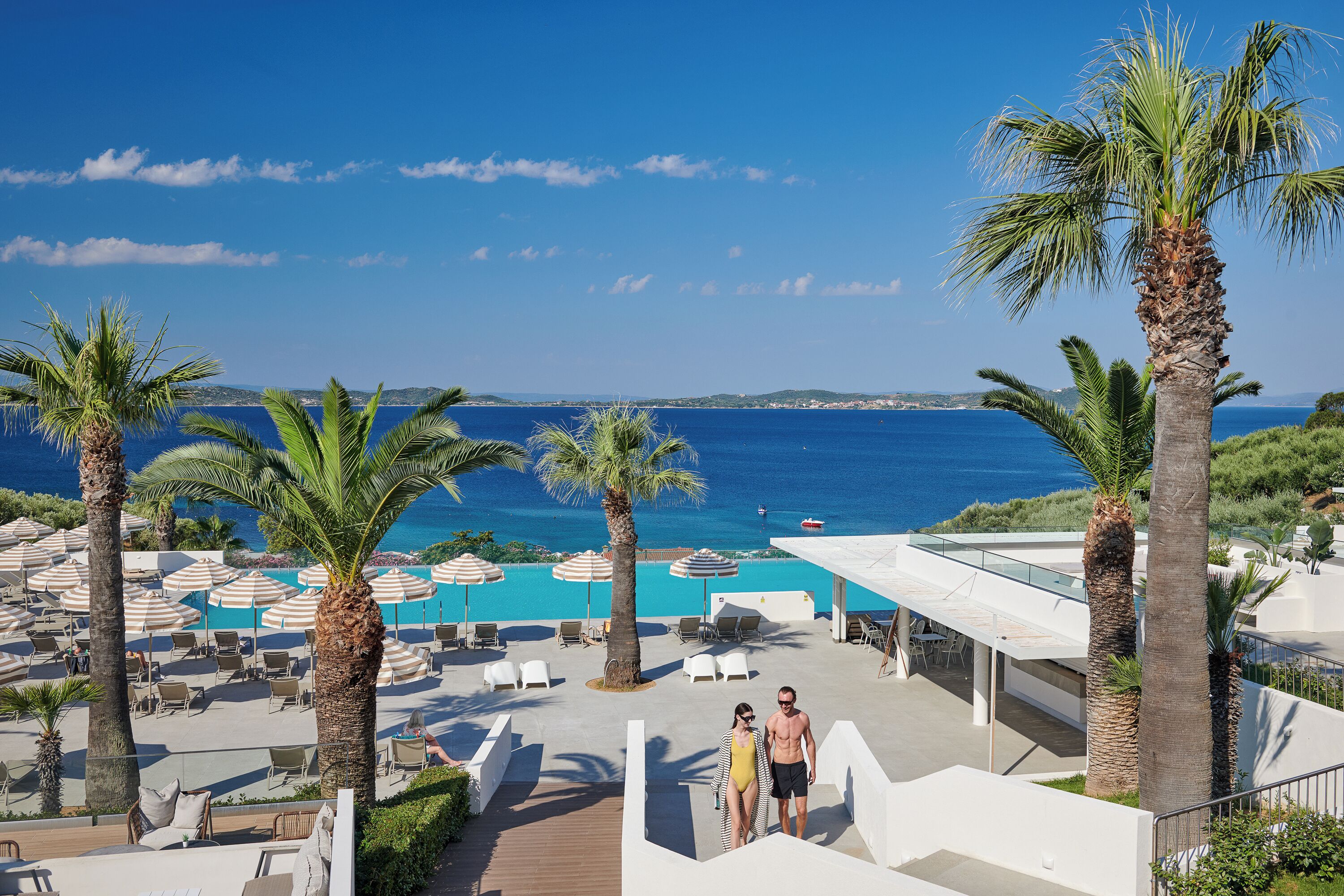 Outdoor pool, open 10 AM to 6 PM, pool loungers