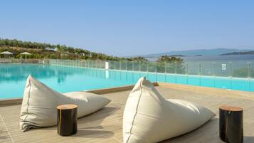 Outdoor pool, open 10 AM to 6 PM, sun loungers