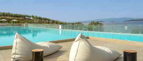 Outdoor pool, open 10 AM to 6 PM, sun loungers