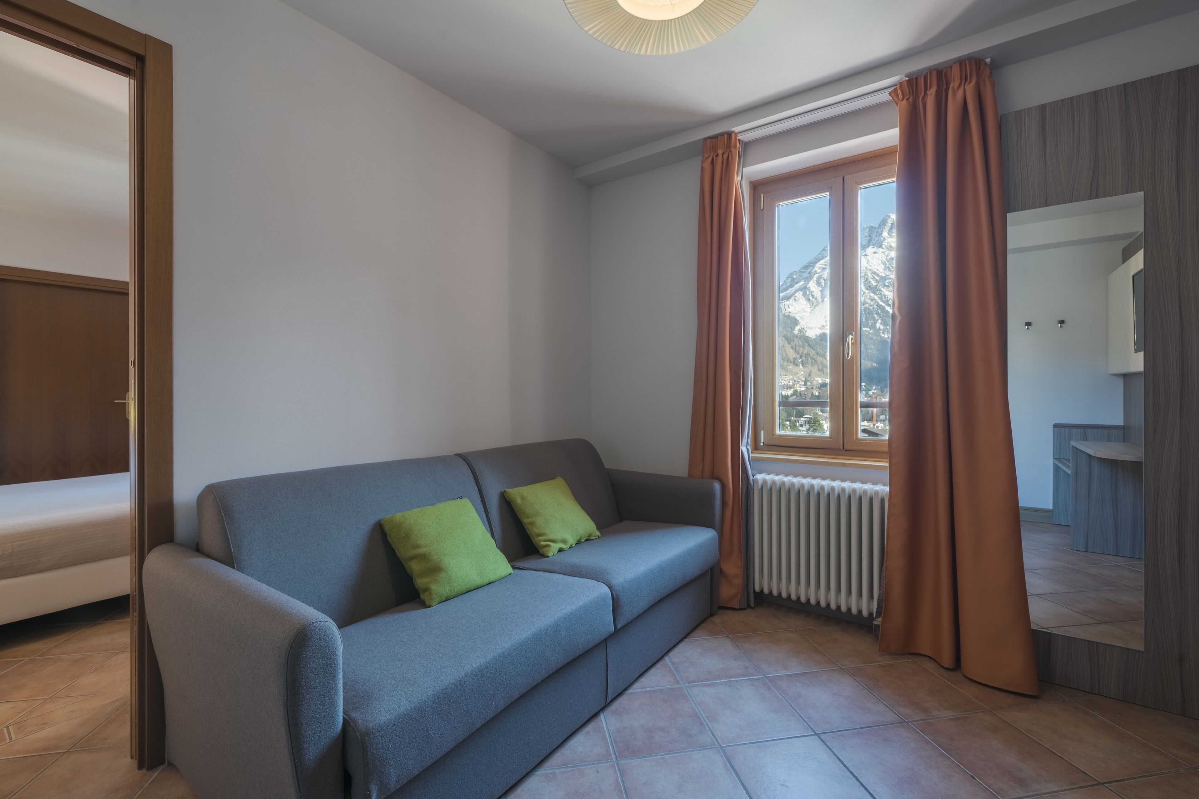 junior suite, mountain view | premium bedding, down duvets, in-room safe, desk