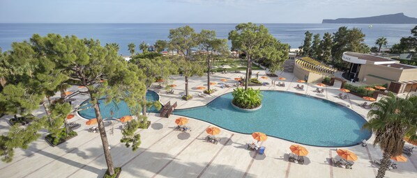 Indoor pool, seasonal outdoor pool, pool umbrellas, pool loungers