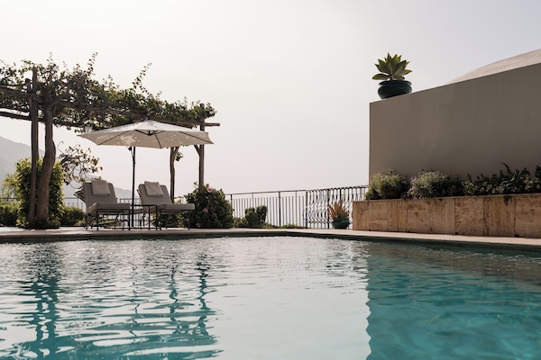 2 outdoor pools, pool umbrellas, sun loungers