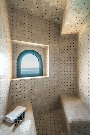 Combined shower/tub, designer toiletries, hair dryer, bathrobes