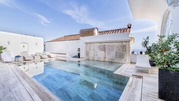 2 outdoor pools, pool umbrellas, sun loungers