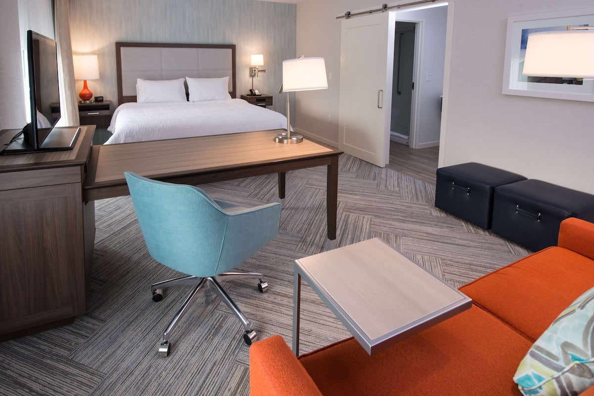 studio suite, 1 king bed, accessible, smoking (roll-in shower) | in-room safe, free cots/infant beds, bed sheets