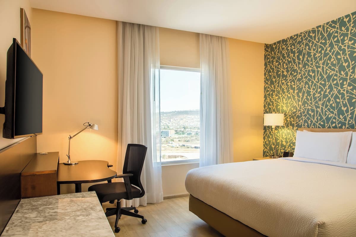 Room, 1 King Bed | In-room safe, desk, iron/ironing board, free WiFi