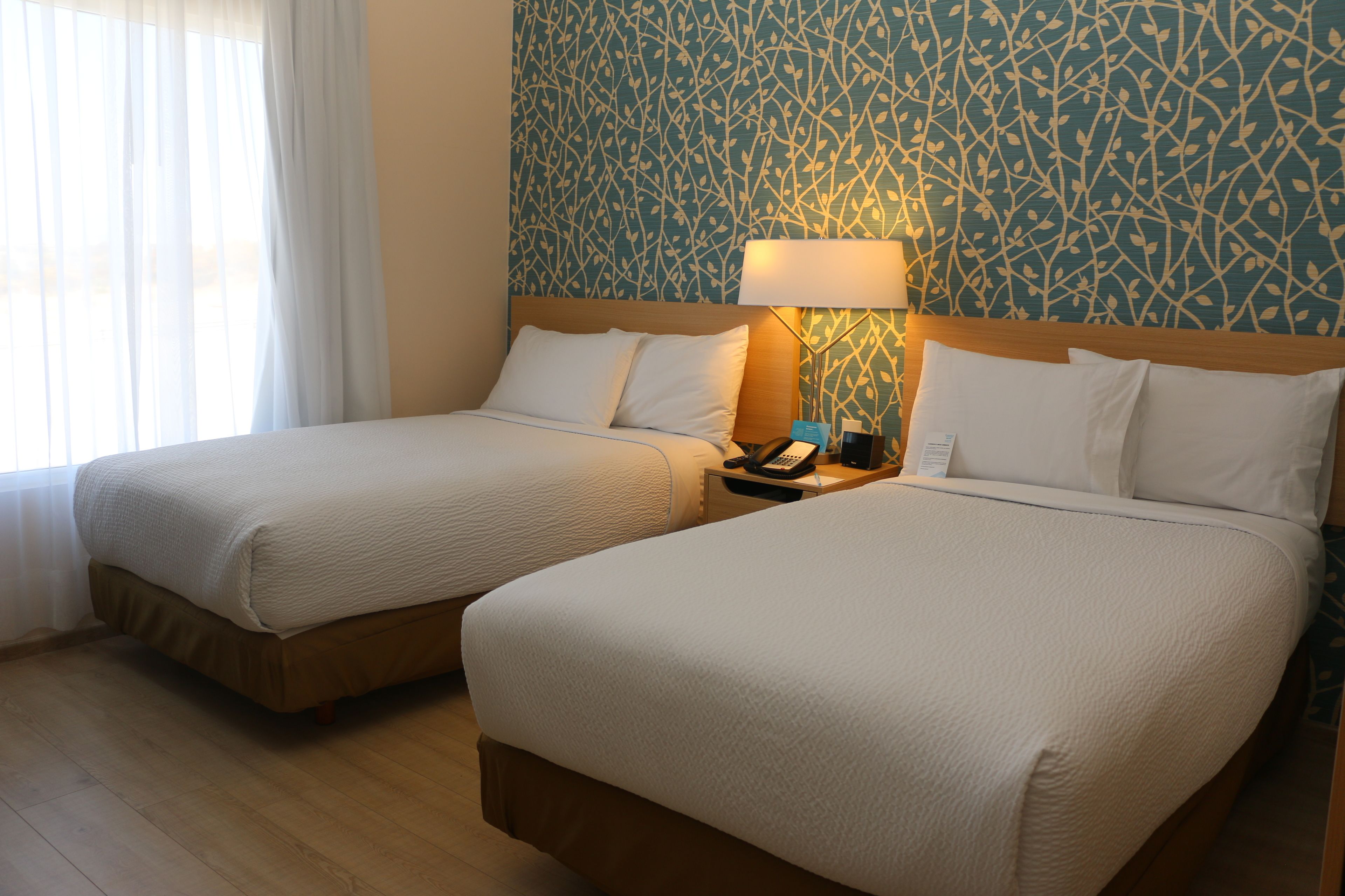 room, 2 single beds | in-room safe, desk, iron/ironing board, free wifi