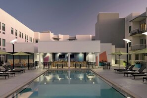 Outdoor pool, open 8:00 AM to 10:00 PM, pool umbrellas