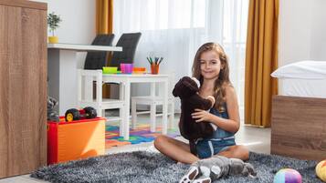 Family Apartment, 2 Bedrooms | Living room | Flat-screen TV