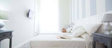 Biancheria da letto di alta qualità, minibar, una cassaforte in camera