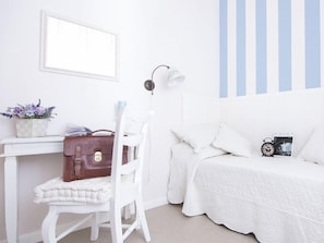 Luxe beddengoed, een minibar, een kluis op de kamer, een bureau