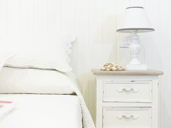 Ropa de cama de alta calidad y minibar