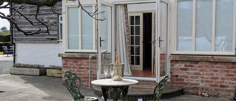 Deluxe Cottage, Patio, Garden View | Exterior detail