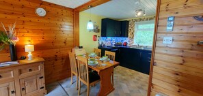 Standard Cabin, 2 Bedrooms, Bathtub (Lodge 5) | Private kitchen | Full-size fridge, microwave, oven, stovetop - Torcroft Lodges (Inverness)