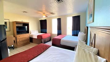 Habitación, varias camas | Wifi gratis y ropa de cama