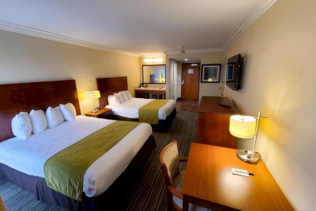 Standard Room, 2 Queen Beds | Desk, laptop workspace, iron/ironing board, free WiFi
