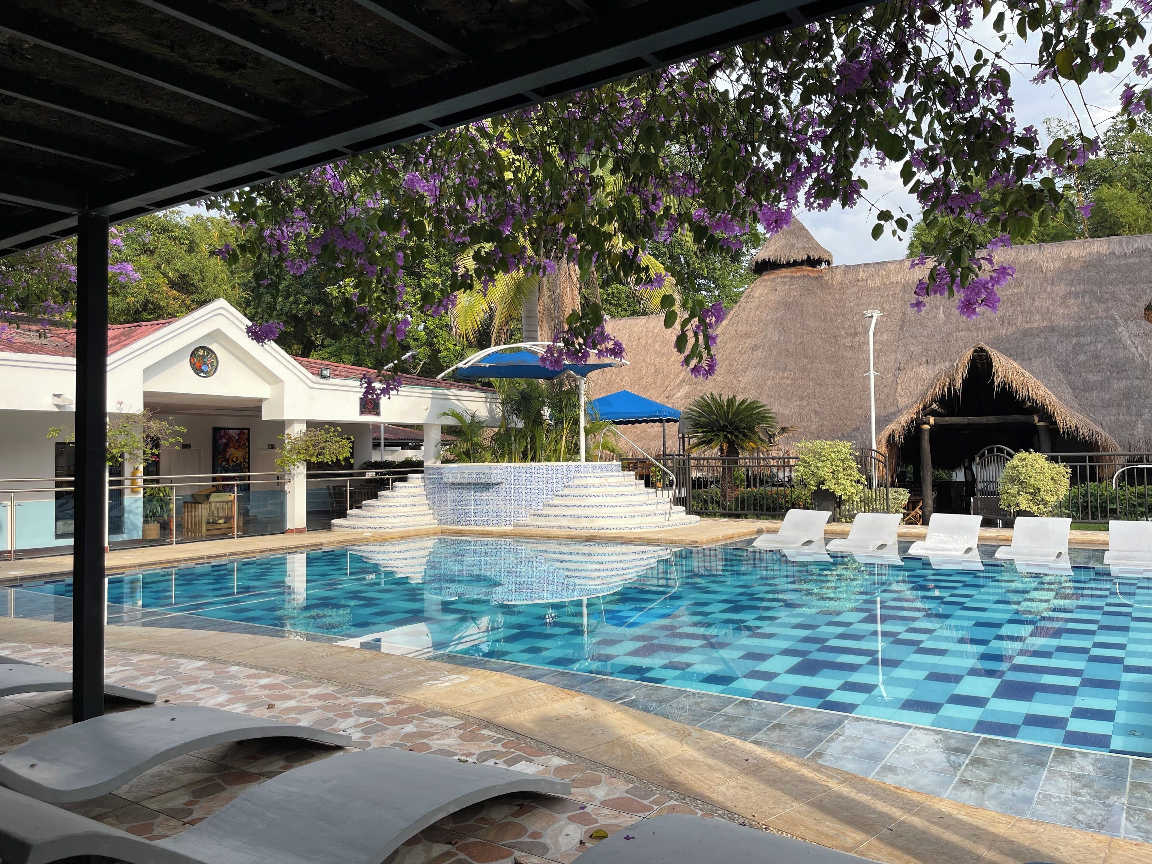 outdoor pool, open 8 am to 9:00 pm, pool loungers