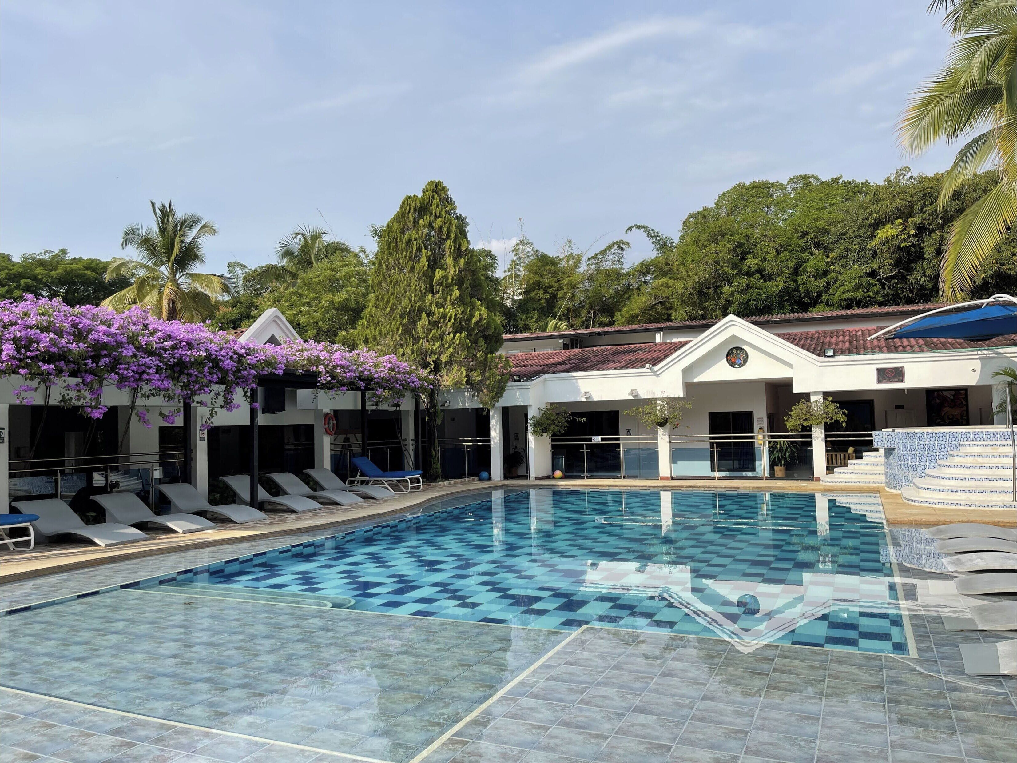 Outdoor pool, open 8 AM to 9:00 PM, sun loungers