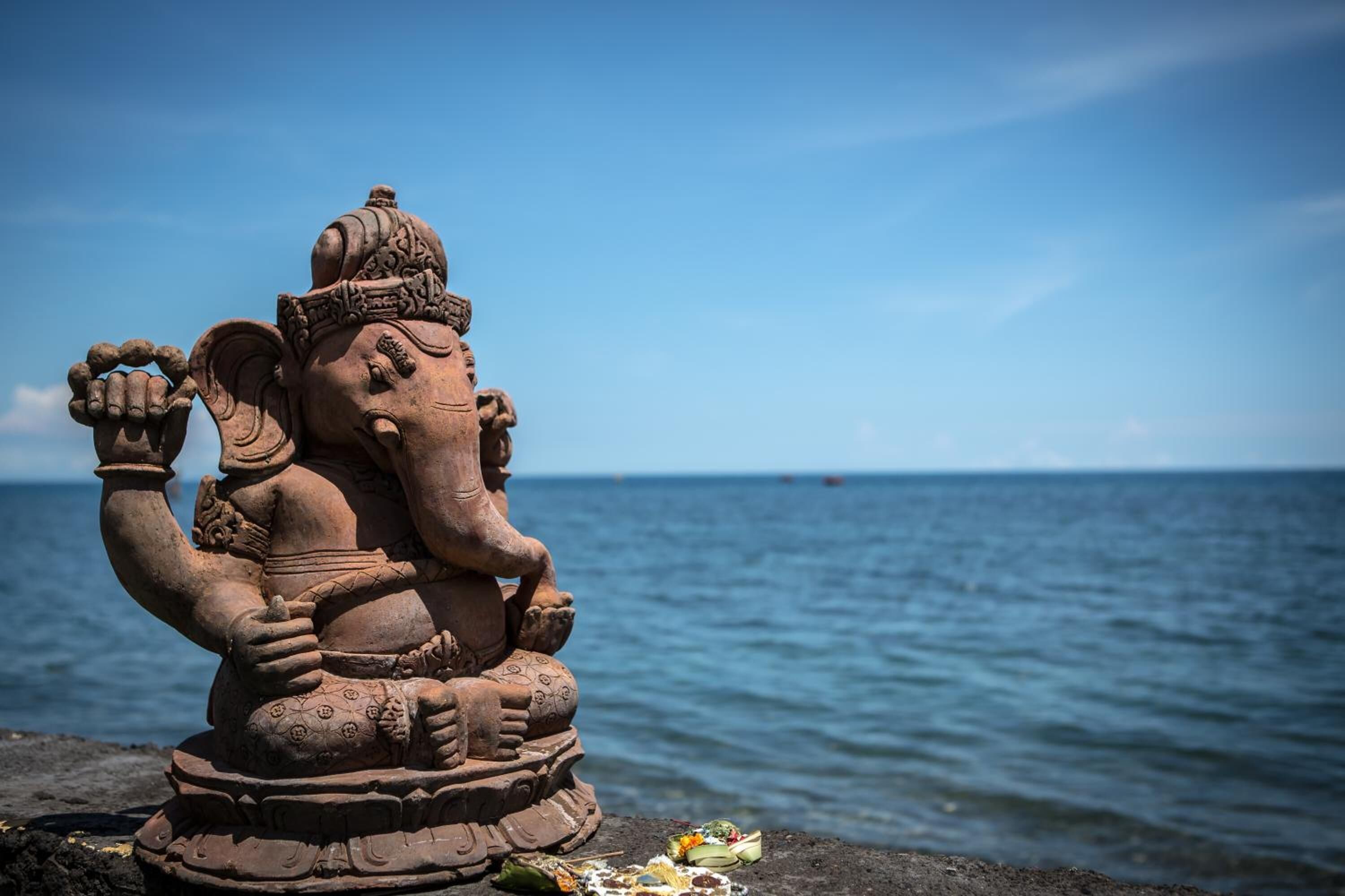 on the beach, sun-loungers, beach umbrellas, beach towels