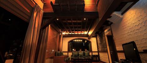 Penthouse | Living area | Flat-screen TV