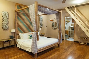 Suíte família, vista para o jardim | Frigobar, Wi-Fi de cortesia, roupa de cama